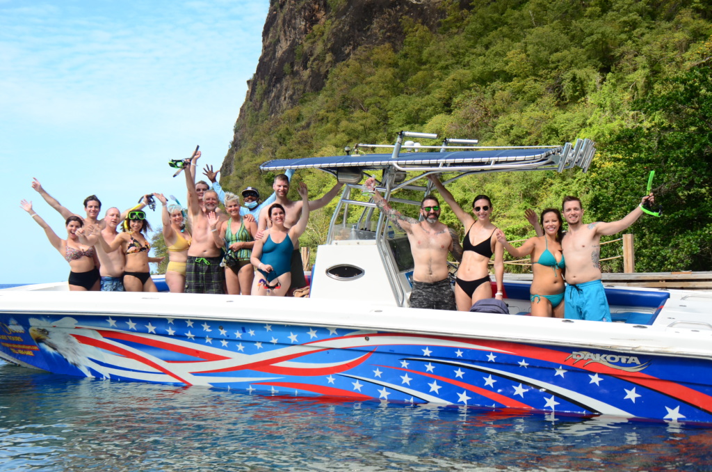 Group of about 15 persons having a good time with the Real Deal Boat Tours