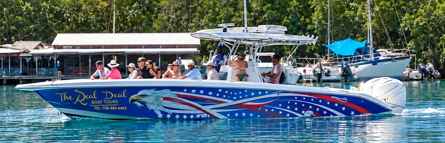 The 37ft Dakota speedboat of The Real Deal Boat Tours with guests on board in Saint Lucia